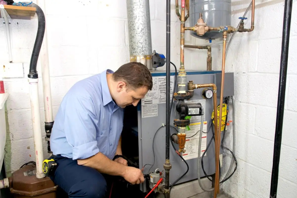 HVAC repair on an indoor boiler system